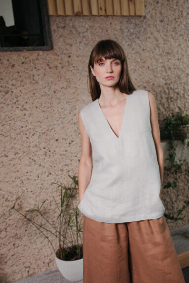 Sleeveless relaxed fit deep V-neckline linen top